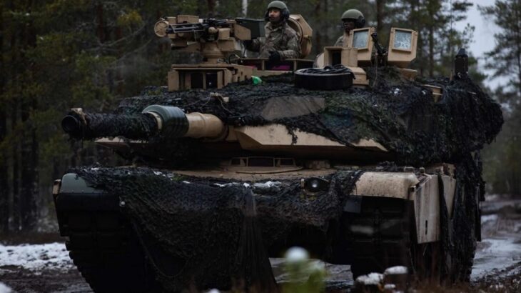 Tank Abrams s maskovací sítí